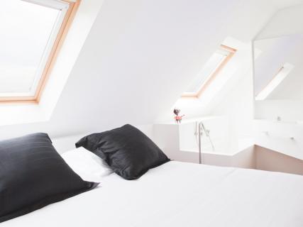 badkamer onder schuin dak